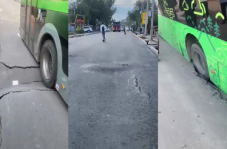 Алматыда жаңа асфальт опырылып, екі автобус түсіп кетті (видео)