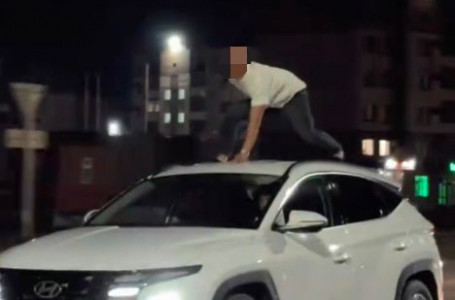 Ақтөбеде жүріп бара жатқан көліктің үстіне шығып видео түсіргендер жазаланды